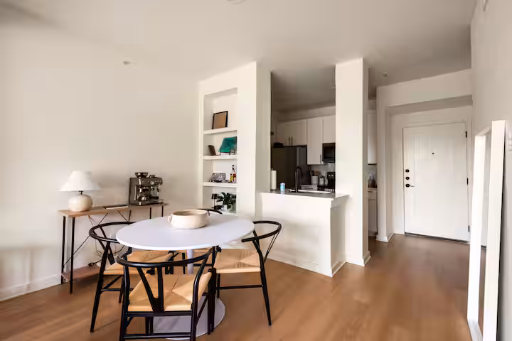 Dining area with built-ins and kitchen pass-through