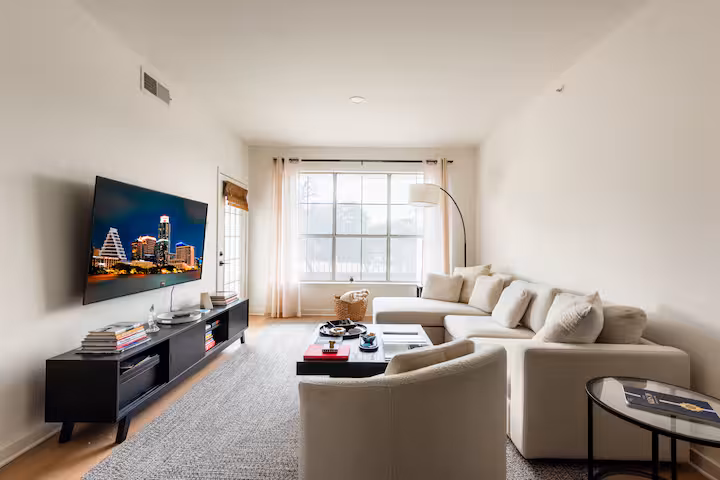 Galley kitchen view with full stainless appliance package